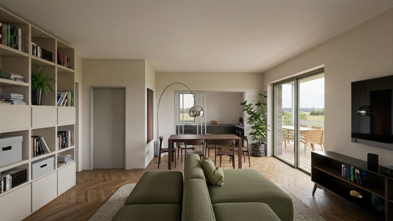 Zona giorno dell'attico da 150 m² con libreria, tavolo da pranzo e vetrata sul terrazzo panoramico